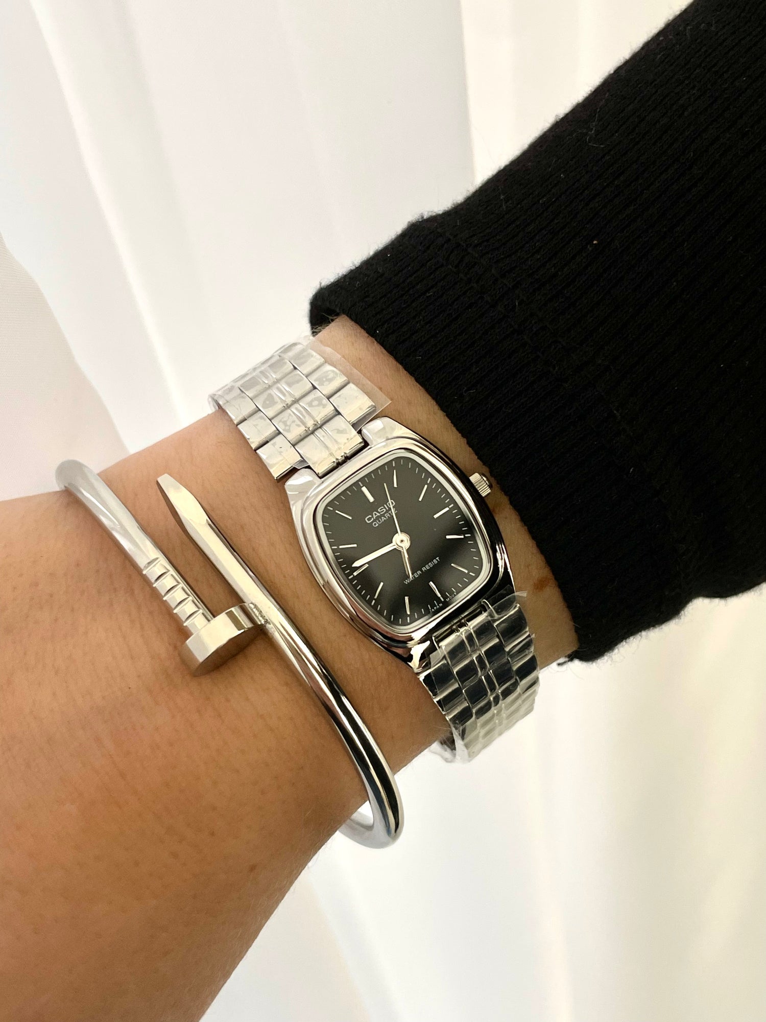 Montrein store. Casio watch and an elegant silver bracelet